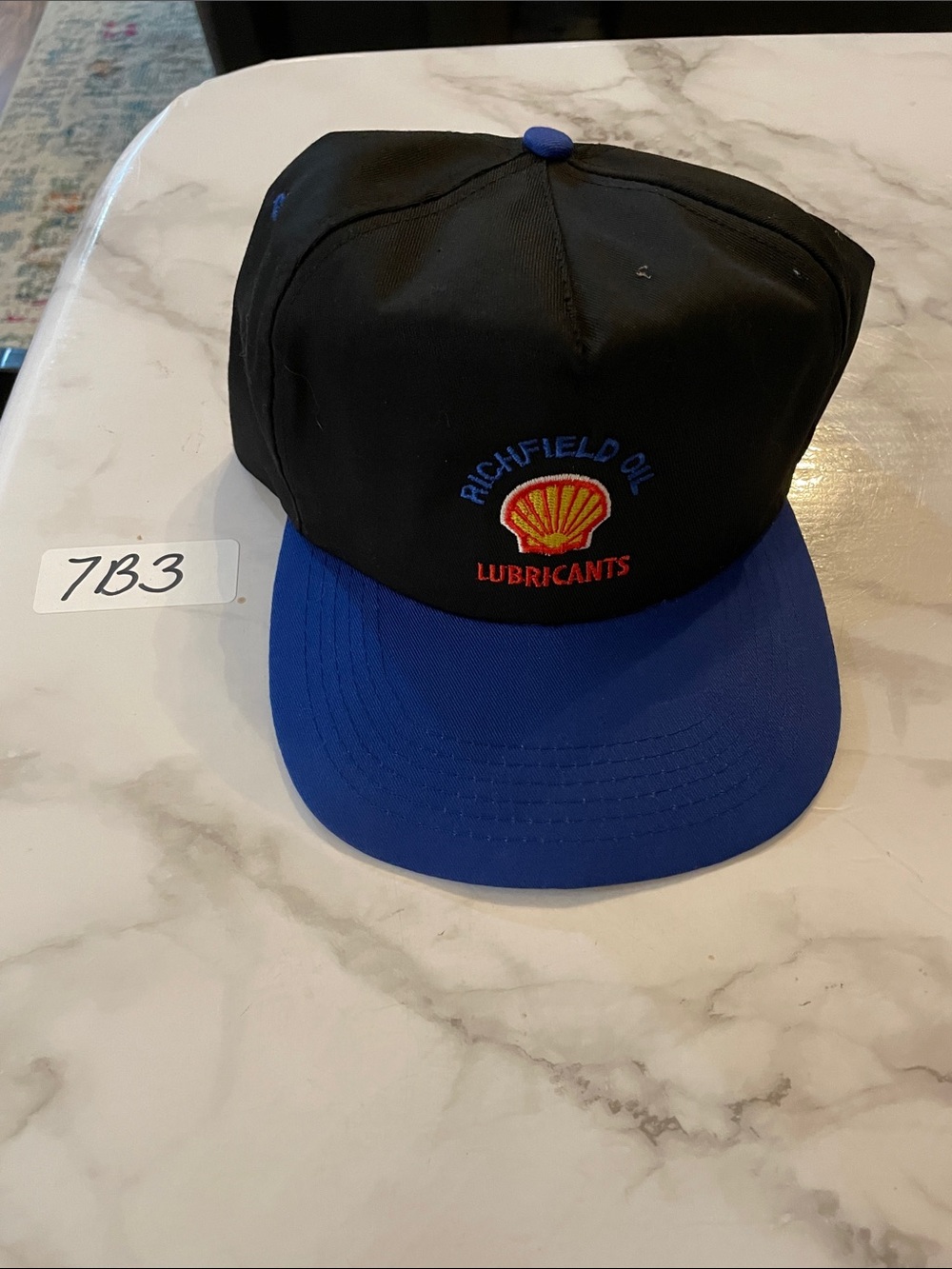 cameo Black Snapback Hat with Blue Brim and Green Underside